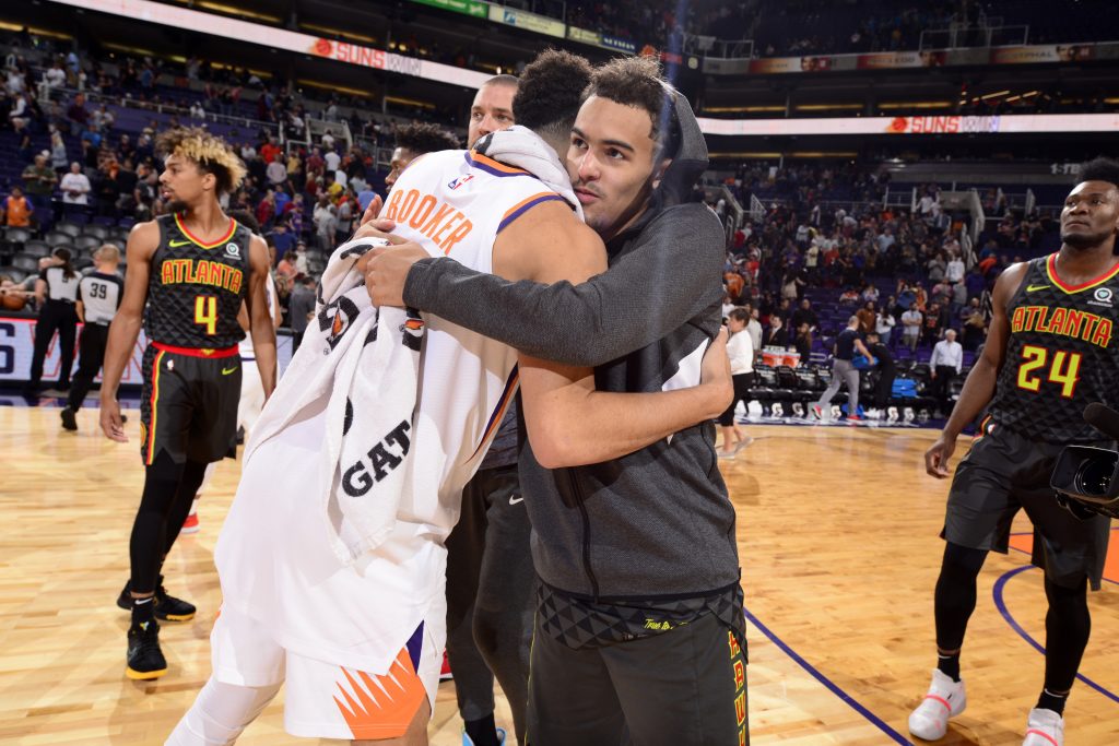 Trae Young y Devin Booker